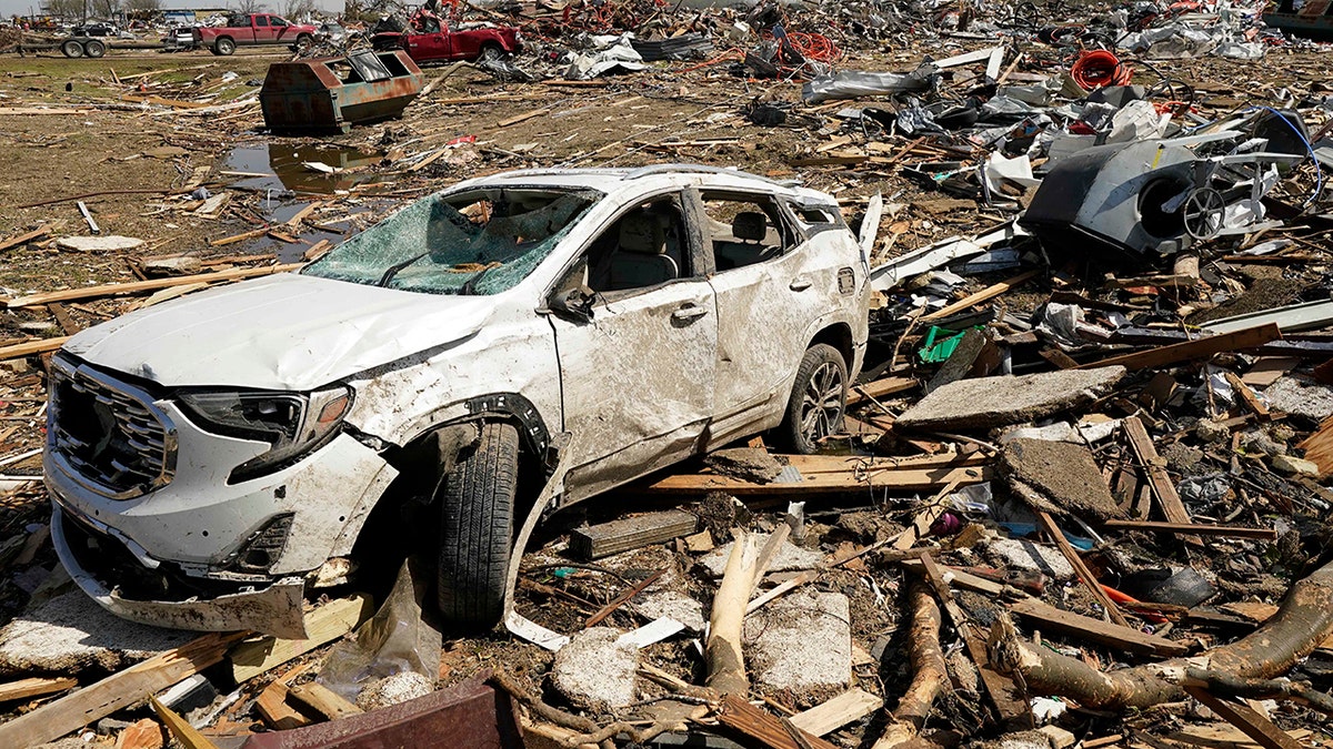 damaged car and debris