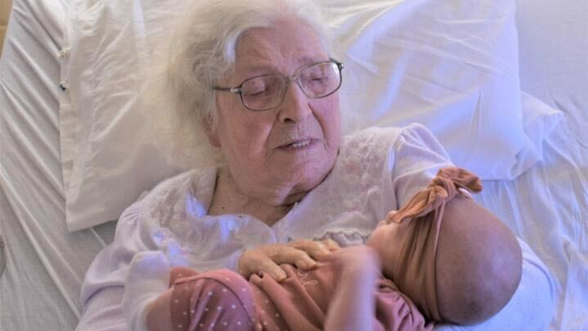 MaeDell Taylor Hawkins holds her great-great-great-granddaughter Zhavia Whitaker