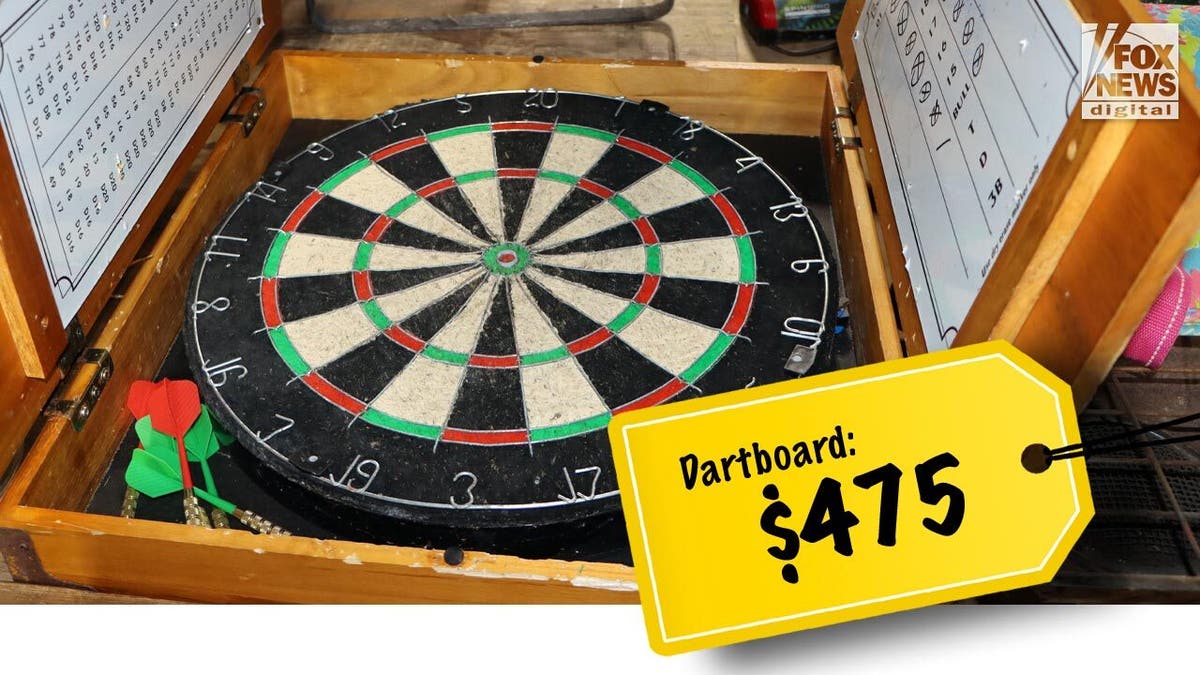 A dart board with Buster Murdaugh's name written on a scoreboard sold for $475.