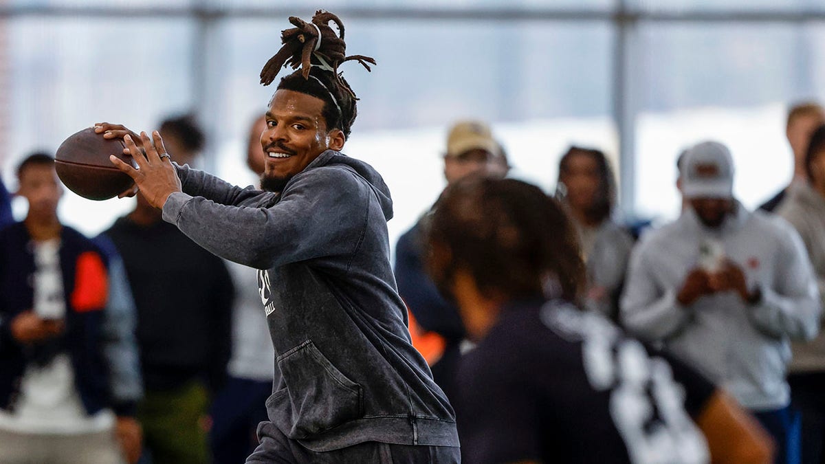 Cam Newton throws a pass at Auburn's Pro Day