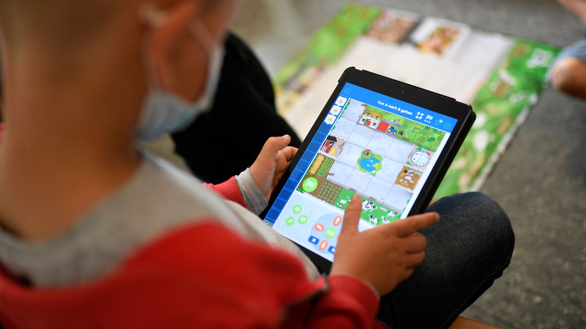 Child with iPad stock image