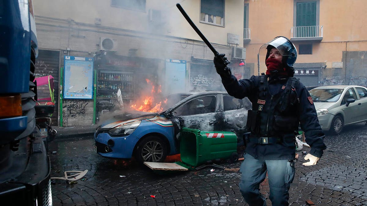 Car burns near Frankfurt supporters