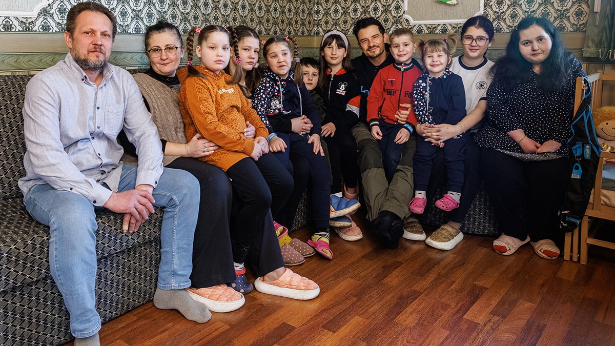 Orlando Bloom visiting a family in Ukraine