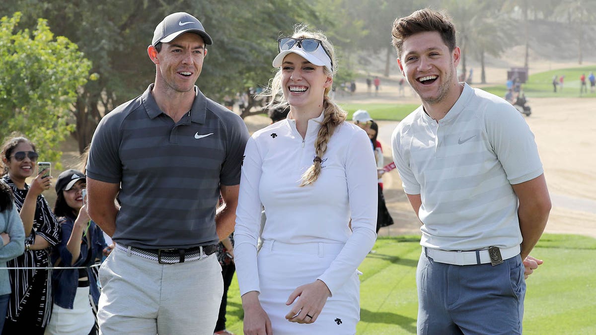 Paige Spiranac with Nial Horan and Rory McIlroy