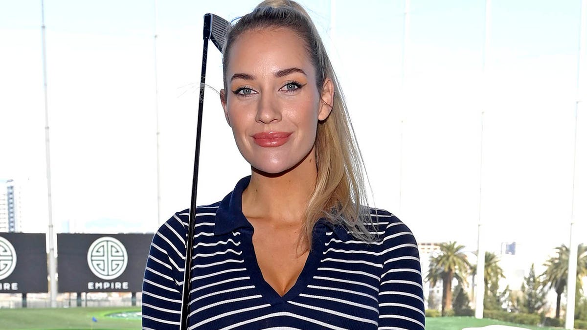 Paige Spiranac checks out her boobs in revealing outfit on golf course  leaving friend baffled