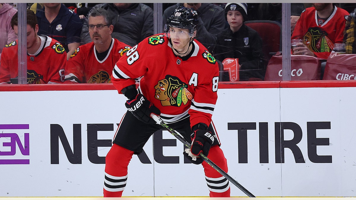 Patrick Kane looks to pass