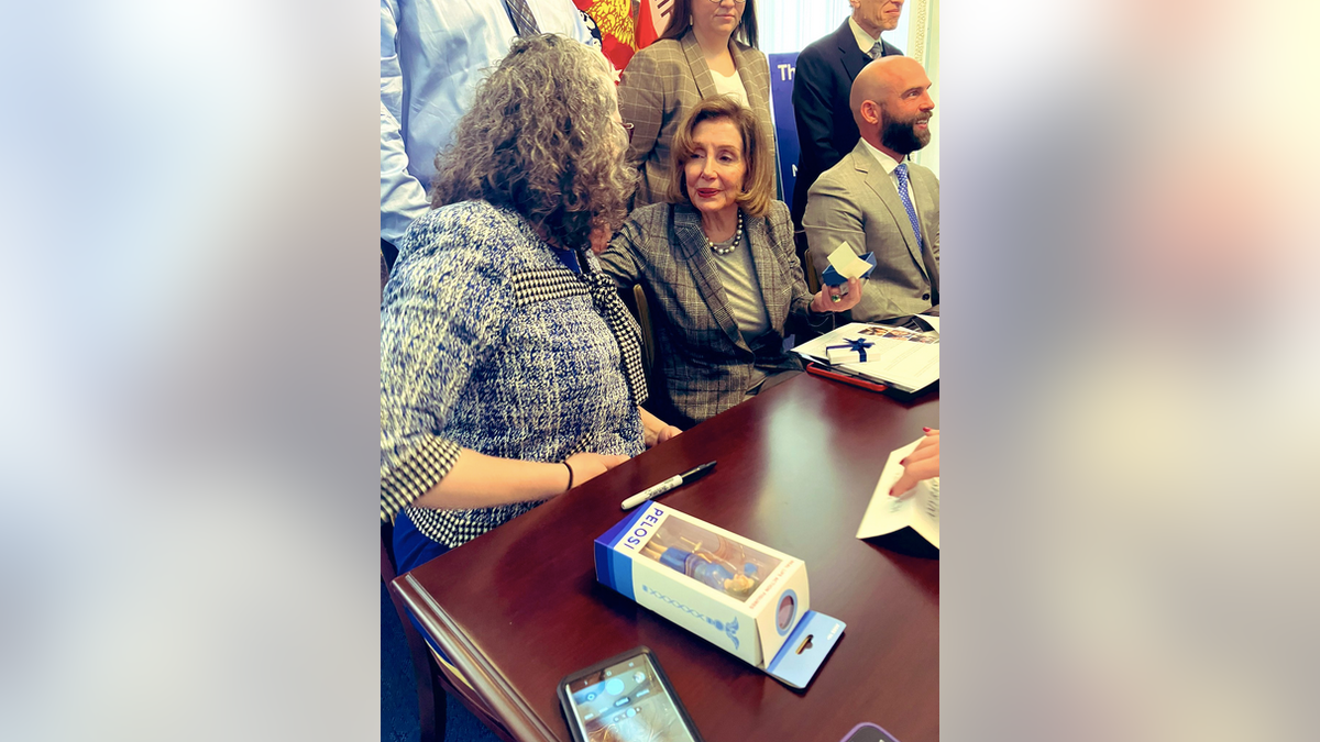 Nancy Pelosi presented an action figure of herself at U.S. Capitol