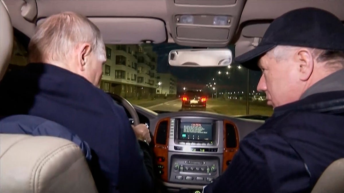 Putin drives car in Ukraine