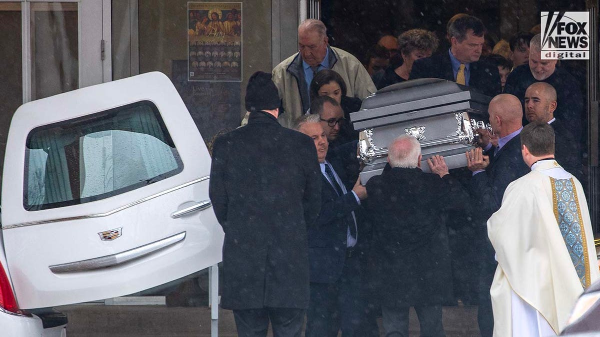 Loved ones of Rebecca Bliefnick attend her funeral at St. Peter Church