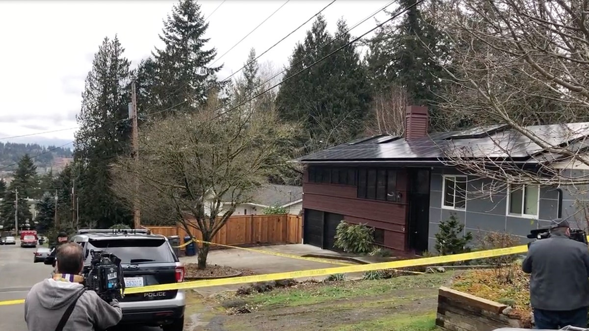 Police tape outside Redmond home