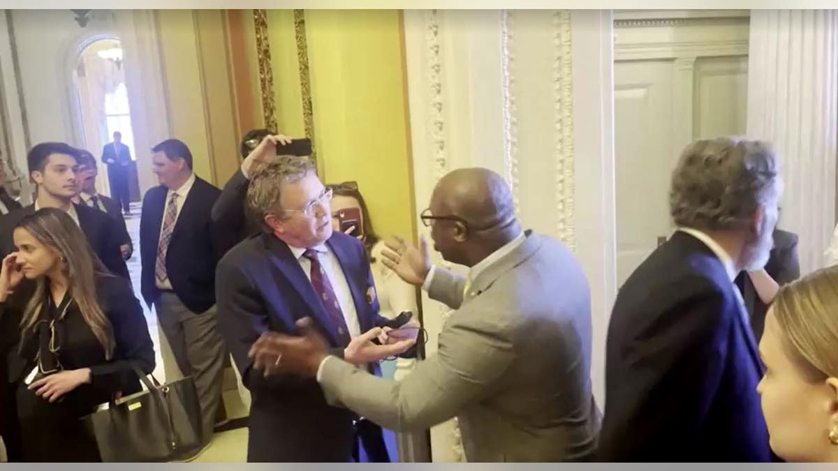 Thomas Massie, R-Ky., left, in heated exchange with Jamal Bowman, D-NY, right