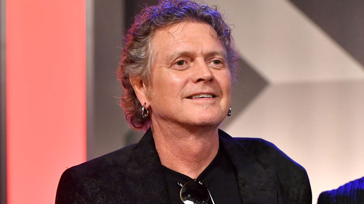 Rick Allen poses for a photo