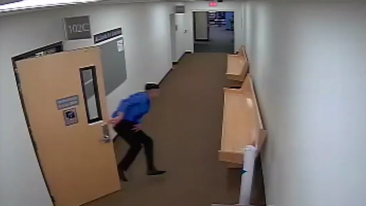 Suspect sprints out courtroom door