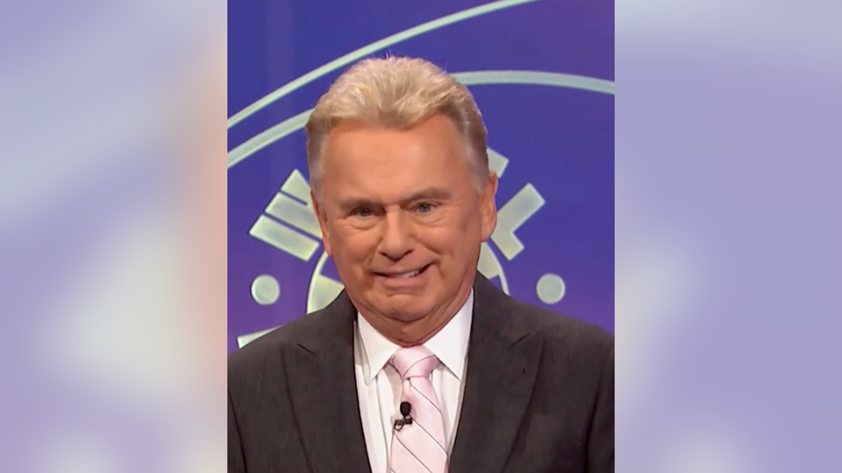 Pat Sajak making an awkward face