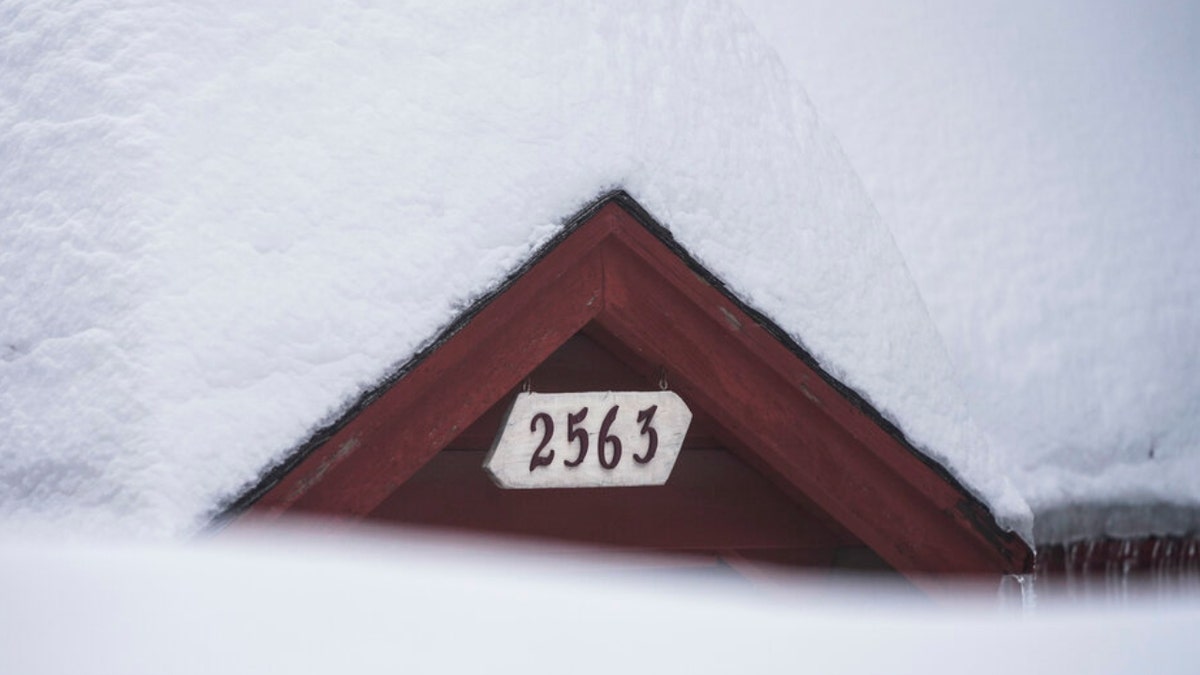 Snow on a home in California