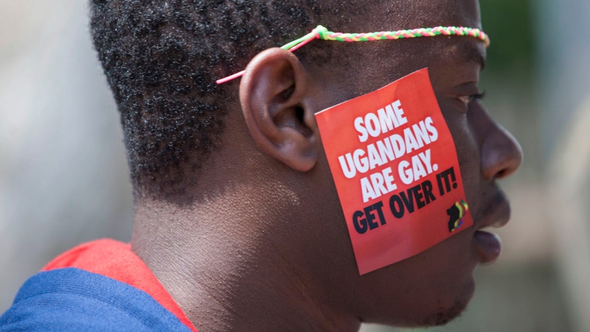 A Ugandan man is seen during the third Annual Lesbian, Gay, Bisexual and Transgender Pride celebrations 