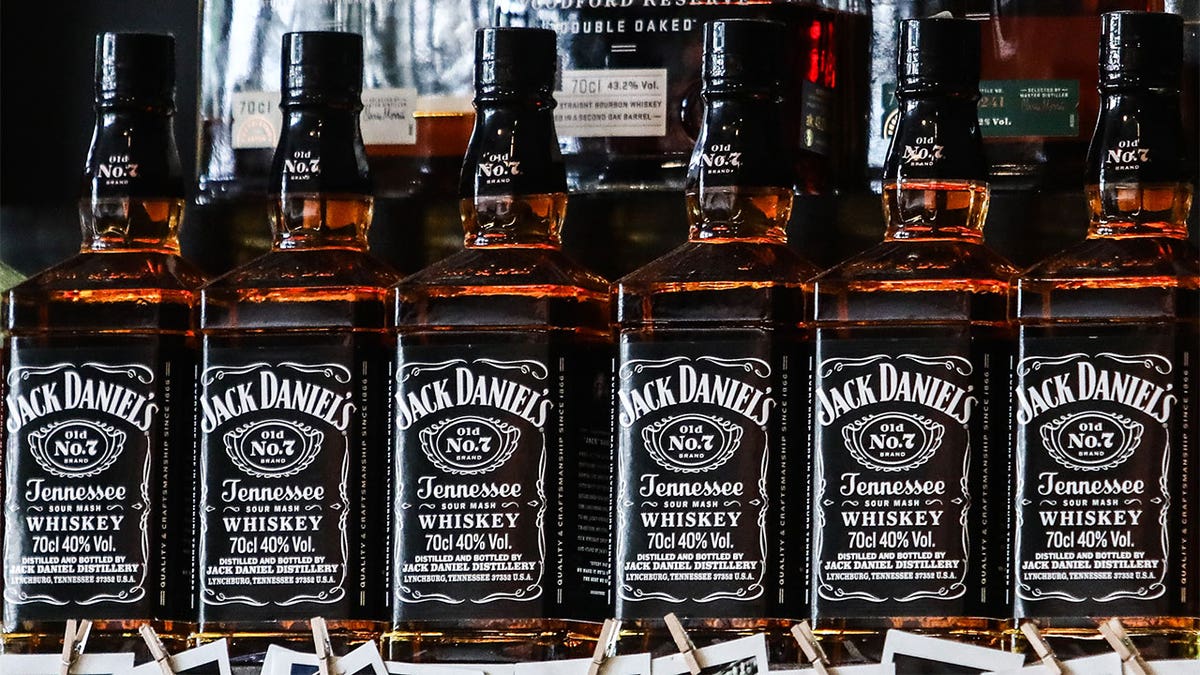 Jack Daniels bottles on a counter.