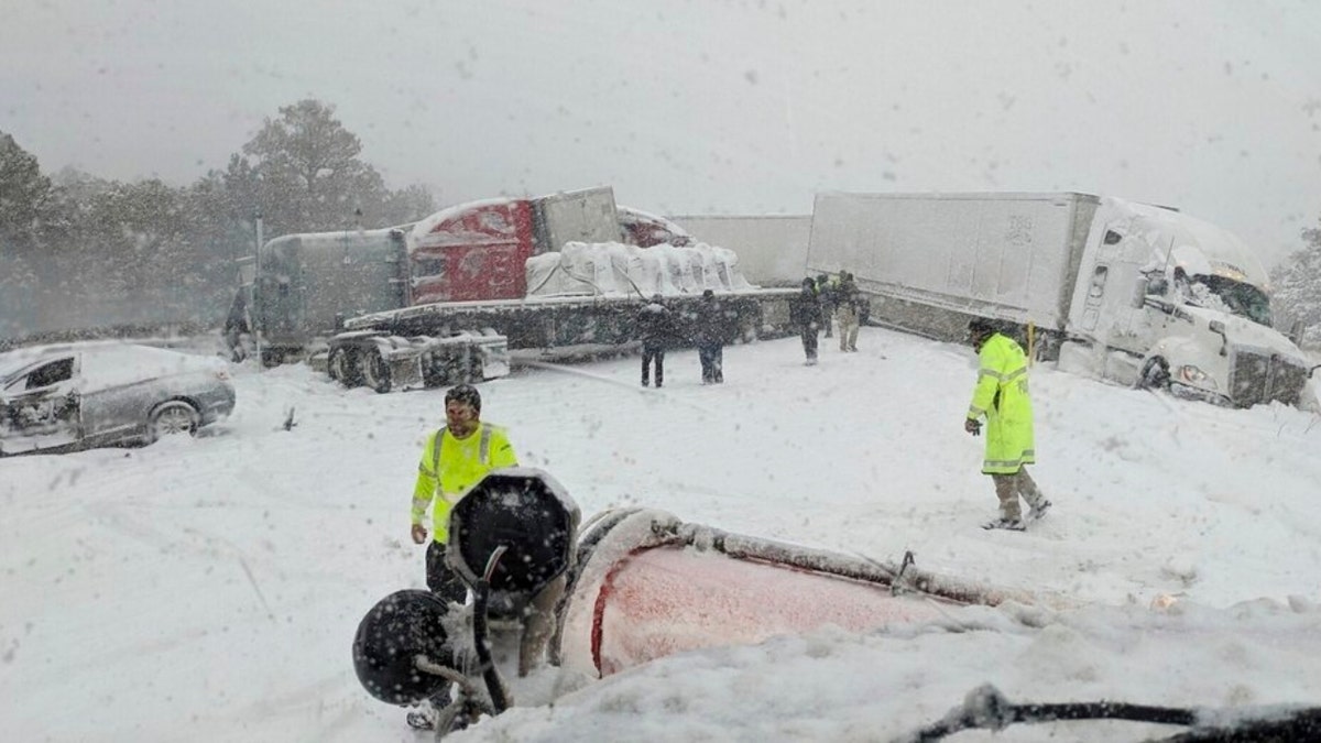 Vehicles snarled by a winter storm on Arizona's Interstate 40