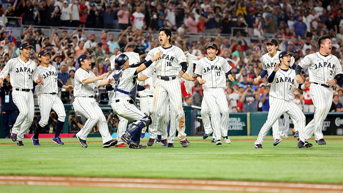 Shohei Ohtani celebrates Japan's win