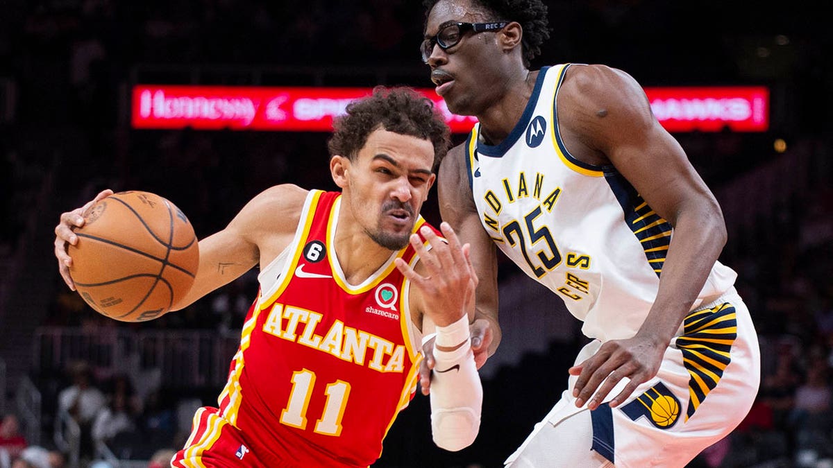 Trae Young drives to the hoop