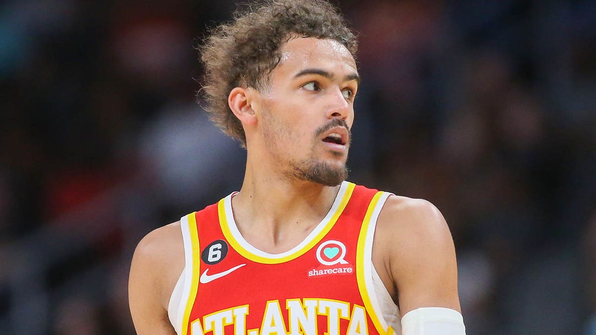 Trae Young looks on