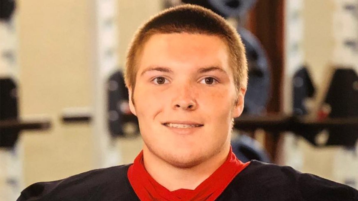 Georgia teen Trent Lehrkampin a football jersey.