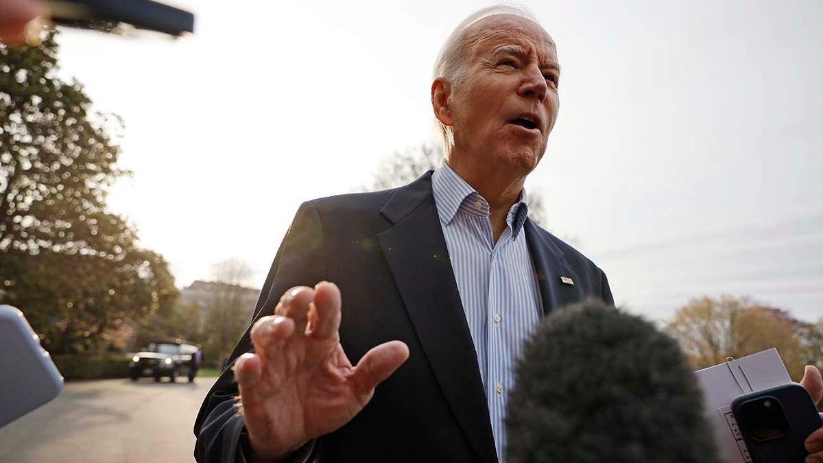 President Joe Biden declines to comment after reporters question him about the criminal indictment of former President Donald Trump