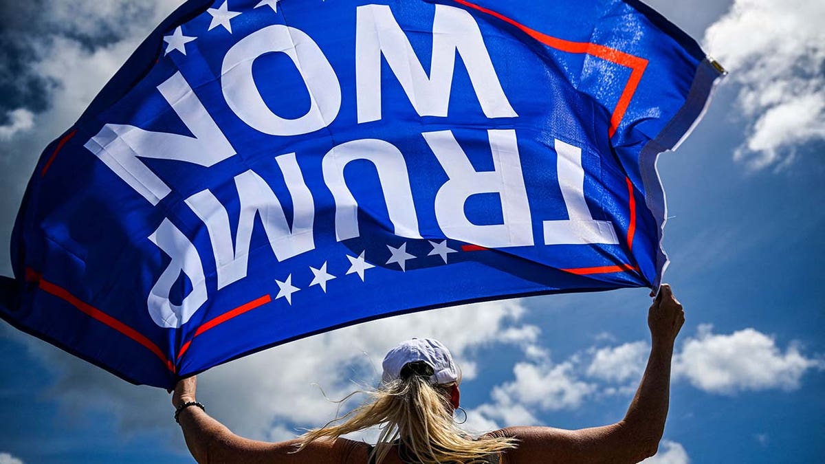 Supporters of former President Donald Trump protesting near Mar-a-Lago Club in Palm Beach Florida