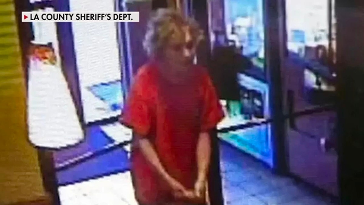 Person with Disheveled hair in restaurant entrance