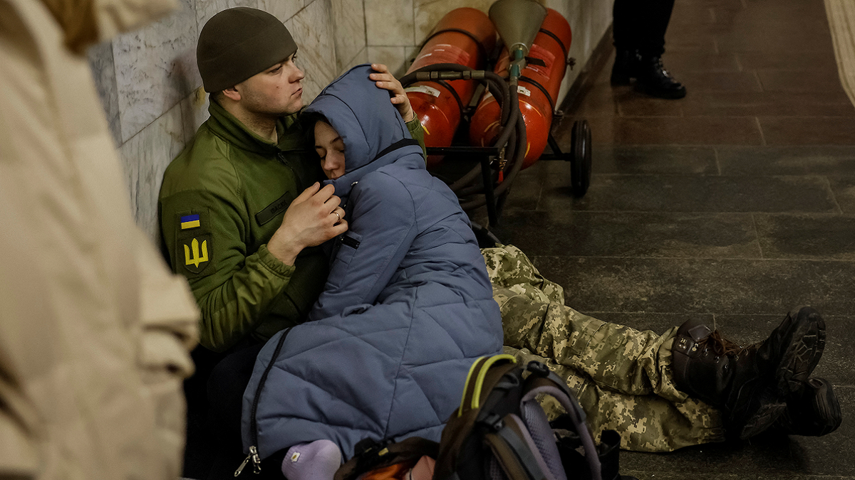 Ukrainians take shelter during Russian missile strikes