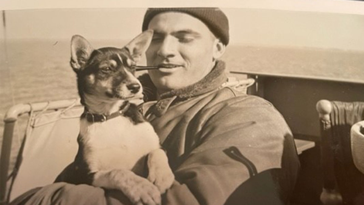 Al Sitarski holding a dog
