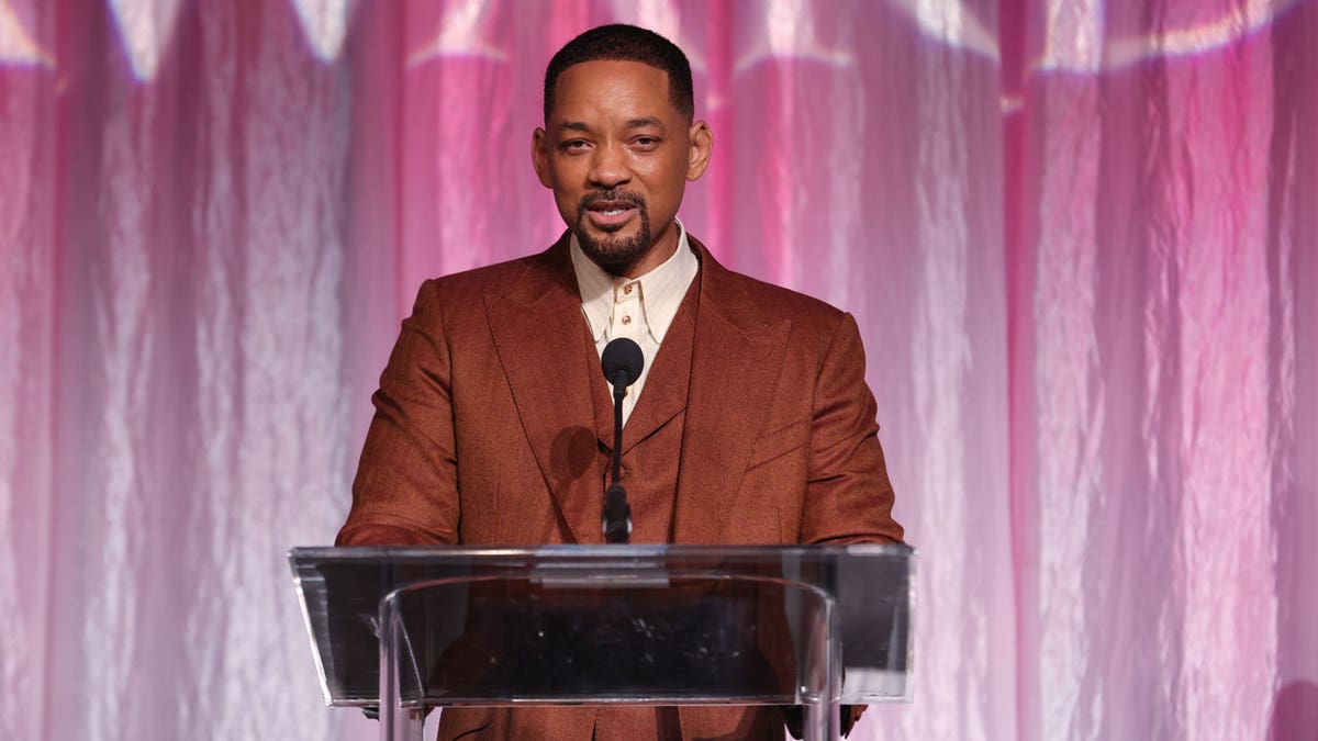 Will Smith giving a speech at an awards show