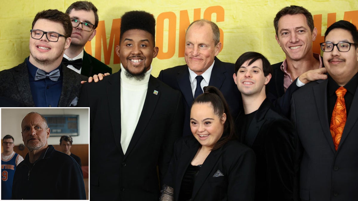 woody harrelson poses with champions cast next to image of woody harrelson in movie