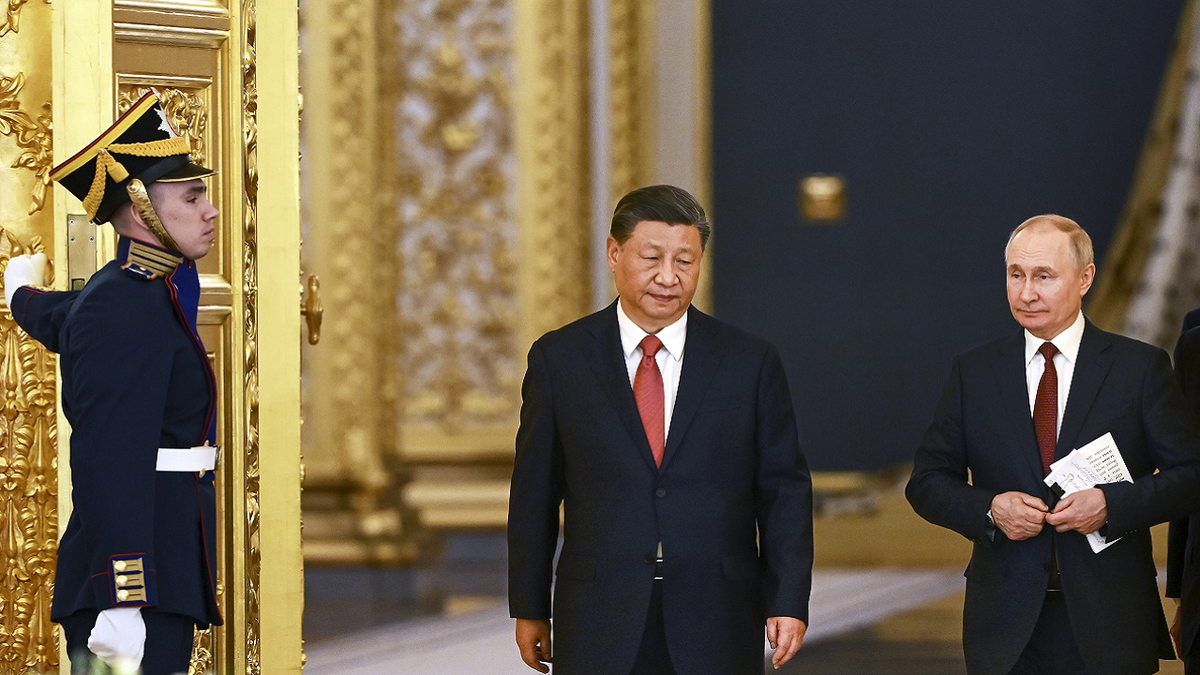 Xi Jinping and Vladimir Putin hold second day of meetings in Russia