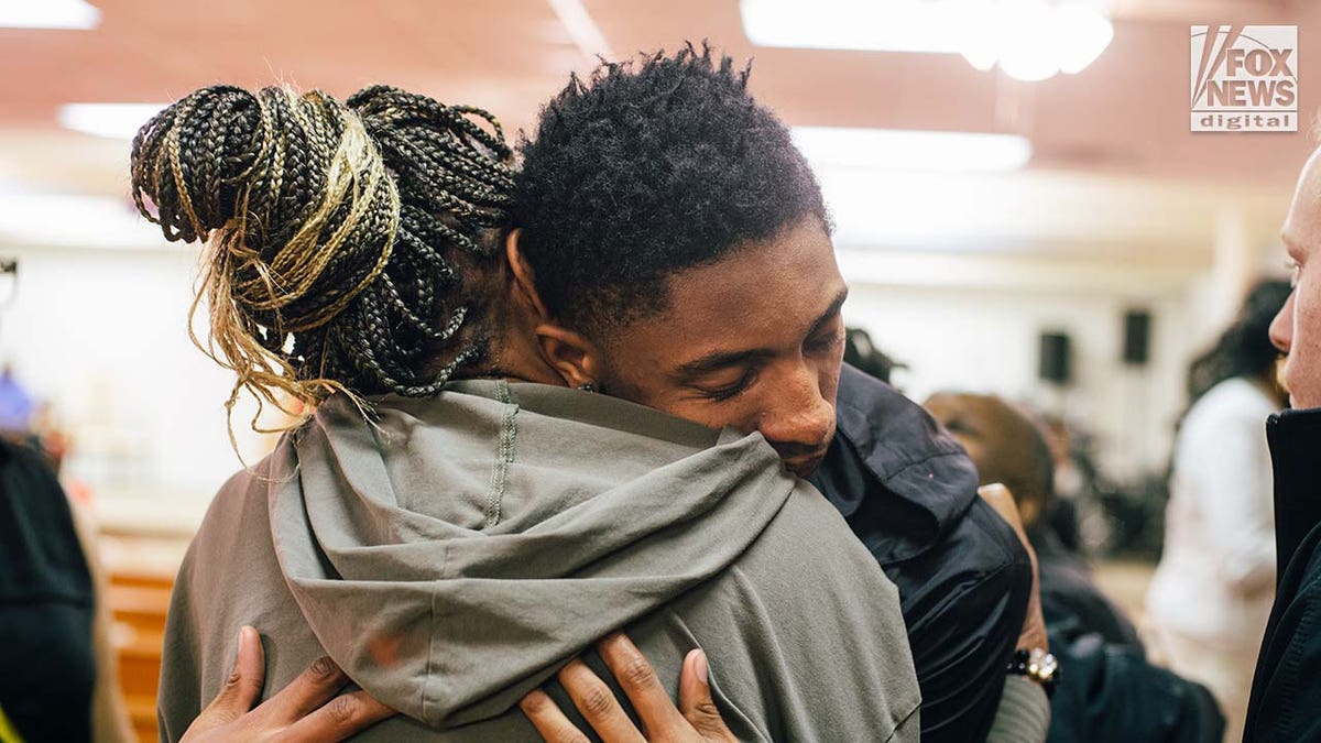 Friends, family, and church members mourn the loss of Zindell Brown at a church in Scranton, South Carolina.