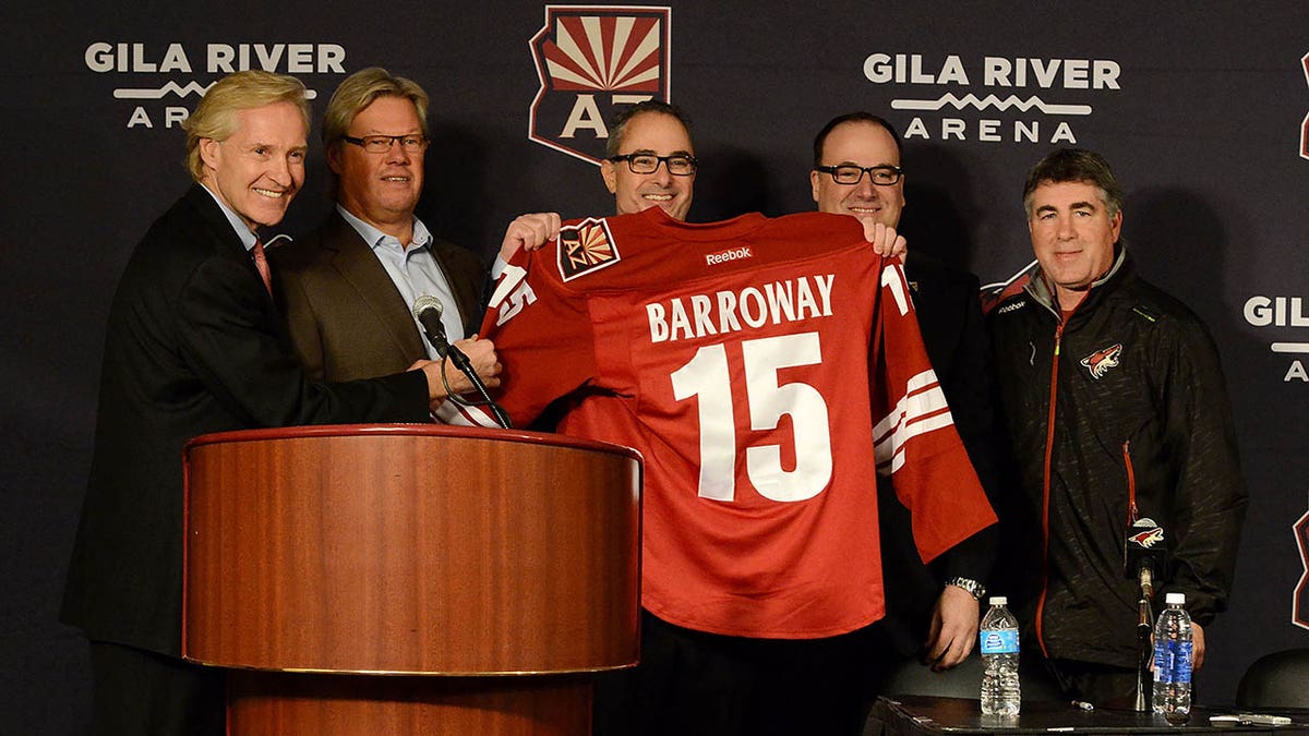 Andrew Barroway with coyotes jersey