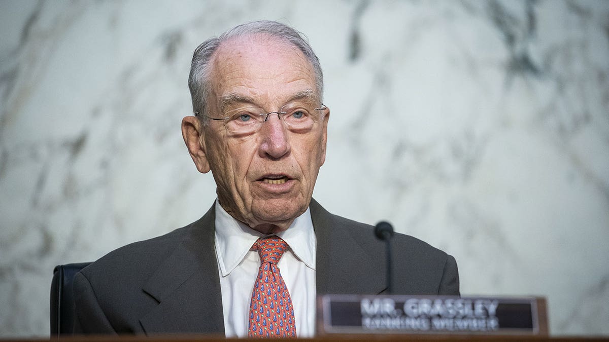 Sen.  Chuck Grassley spoke into the microphone during the hearing