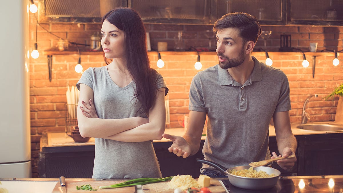 angry couple in kitchen