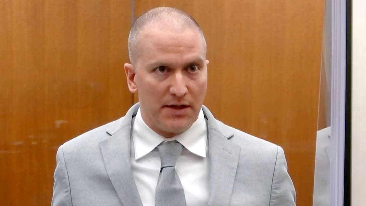 Derek Chauvin in a gray suit in court