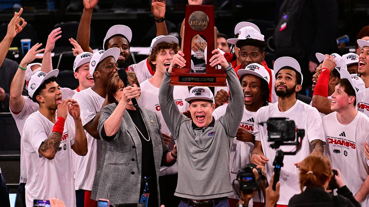 Dusty May hoists regional trophy