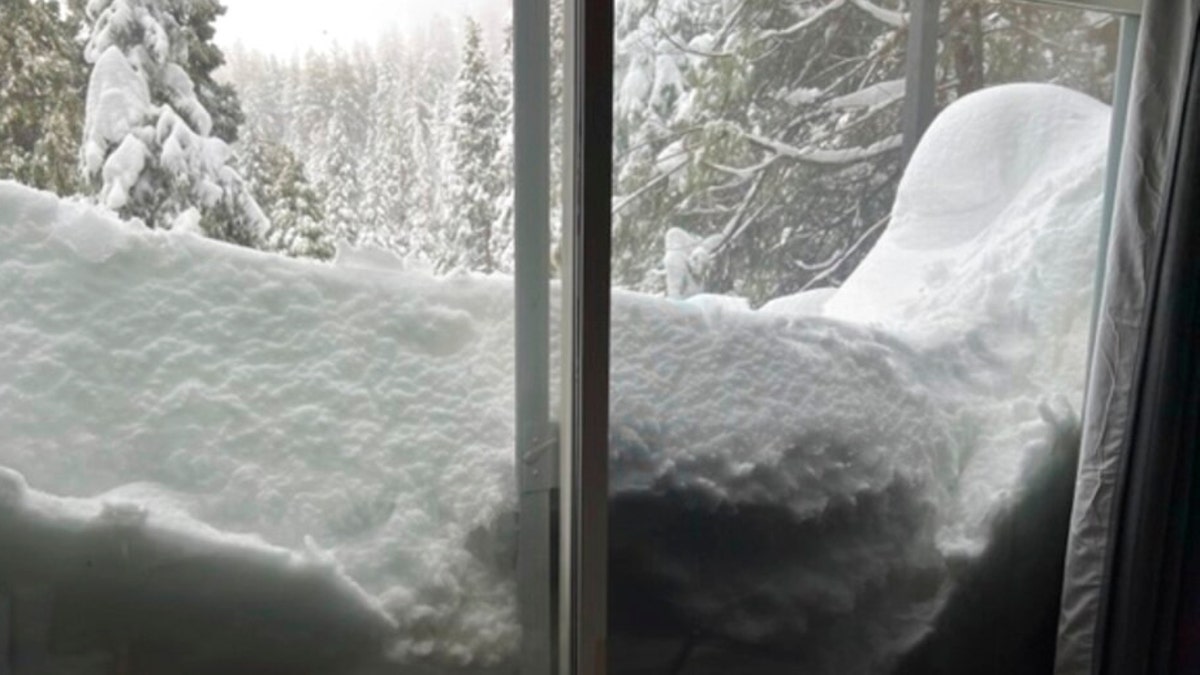 Snow blocks a door