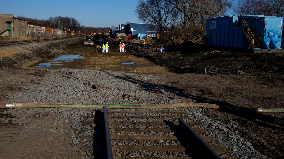 Ohio EPA and EPA contractors collect soil and air samples from the East Palestine derailment site