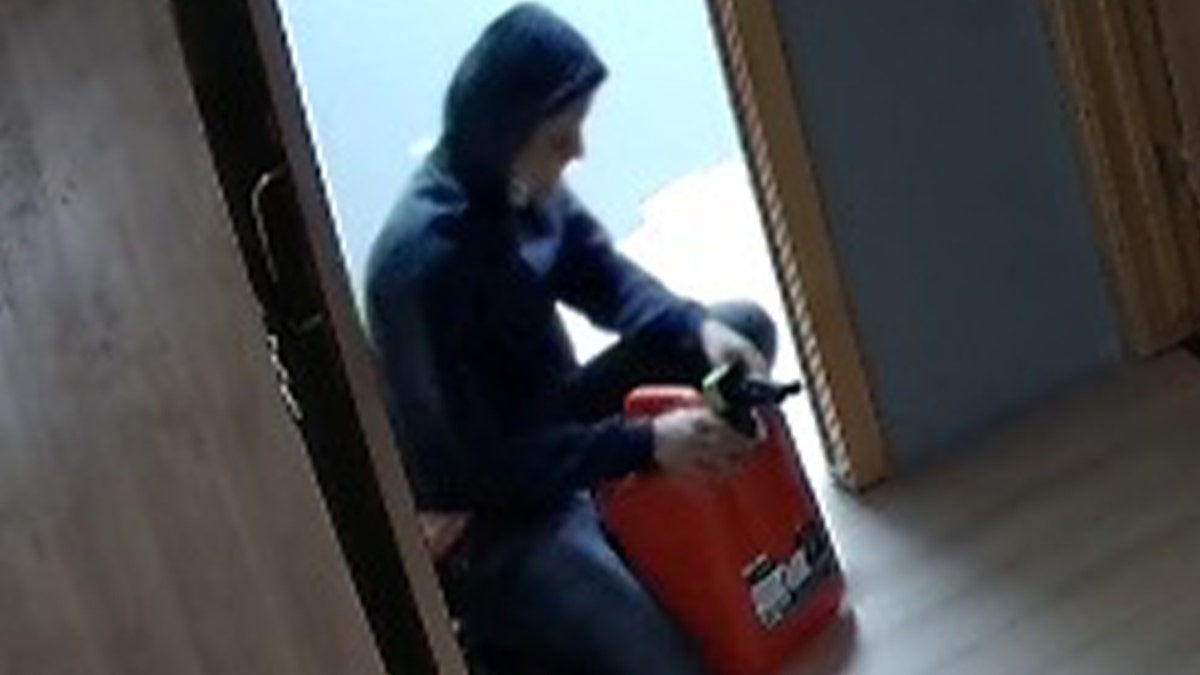 Arsonist holding gas can