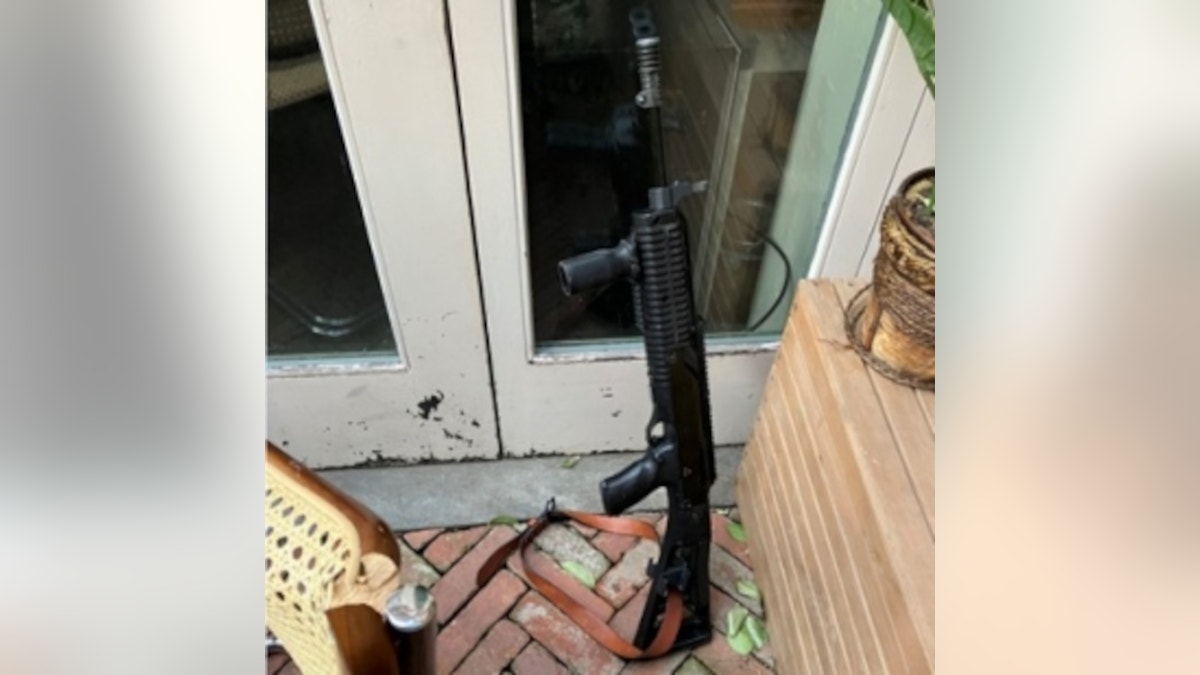 A loaded semiautomatic Hi-Point carbine rifle recovered at the crime scene