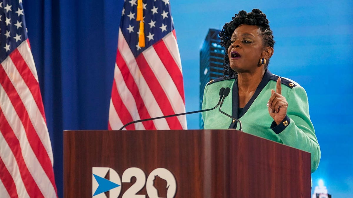 Rep. Gwen Moore speaks at podium during a D-20 event