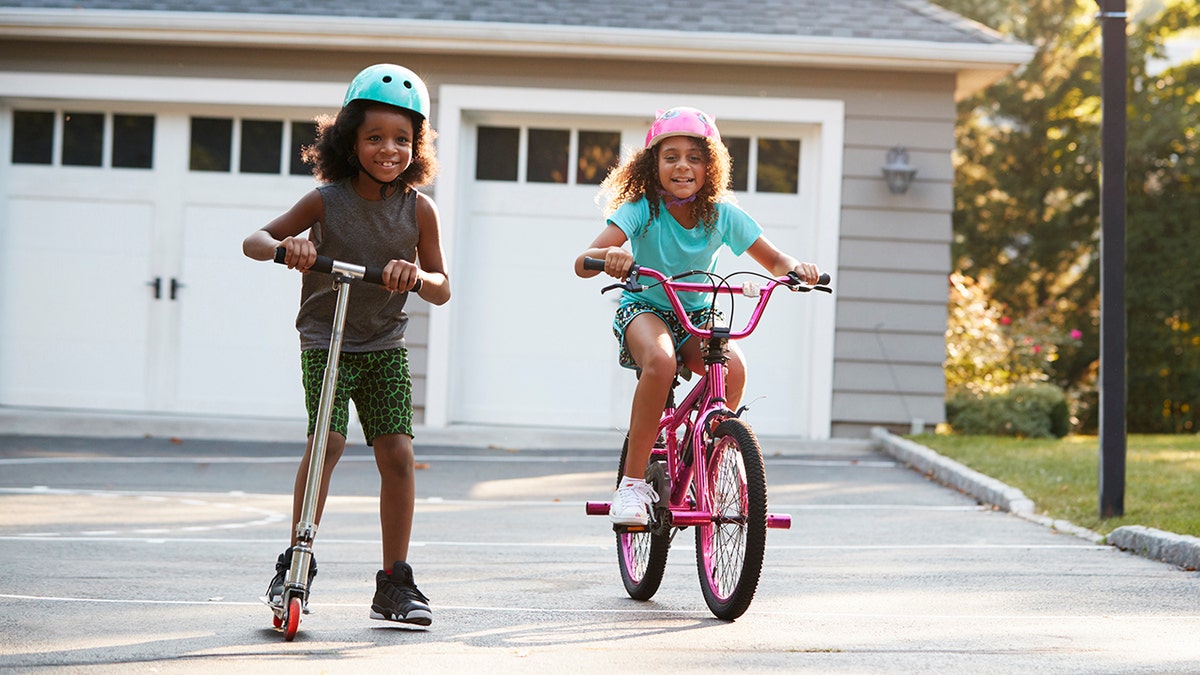 kids on bikes in driveway