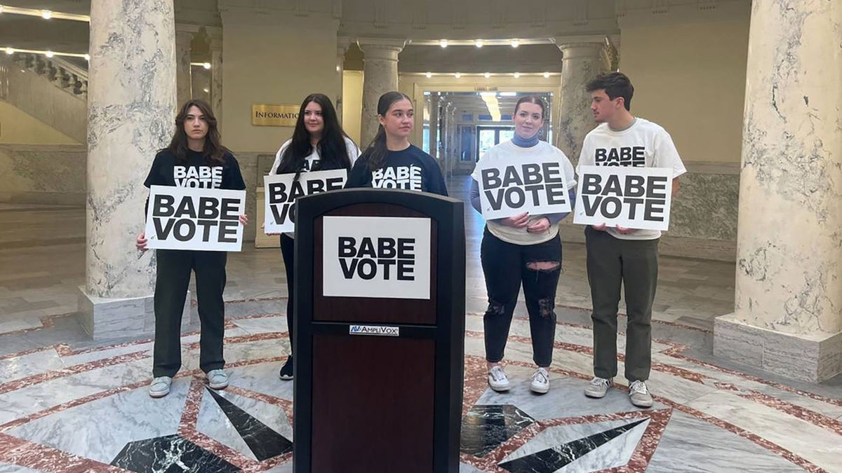 Supporters of BABE Vote, a student activist group, gathered at the Idaho Capitol, announcing a lawsuit to fight a new law that bans students from using student IDs to vote