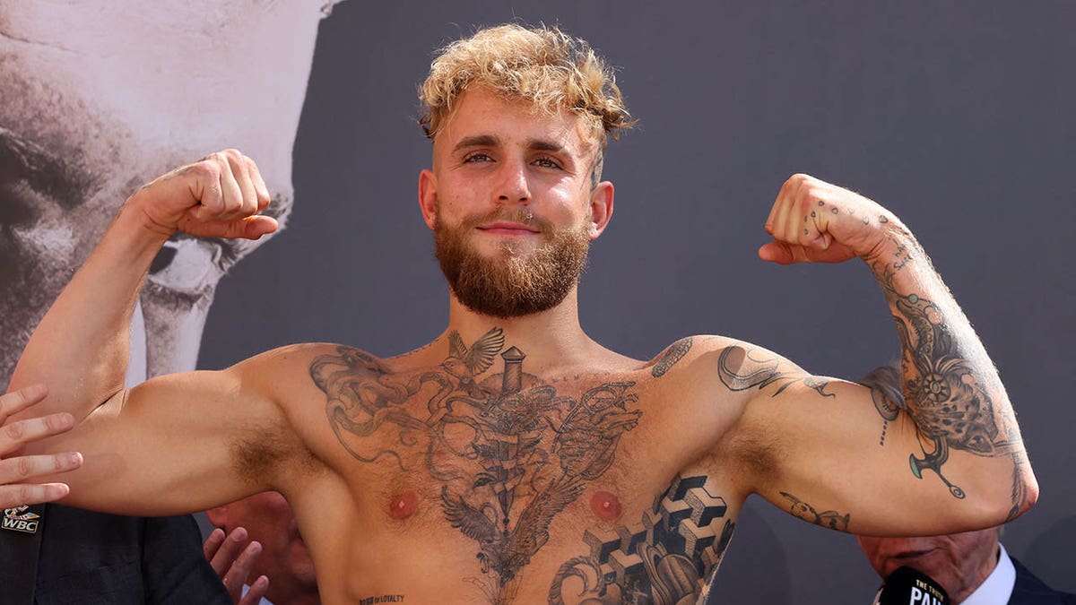 Tyron Woodley gets 'I love Jake Paul' tattoo on middle finger and urges You  Tube star to 'come and get this a** whippin' | The US Sun
