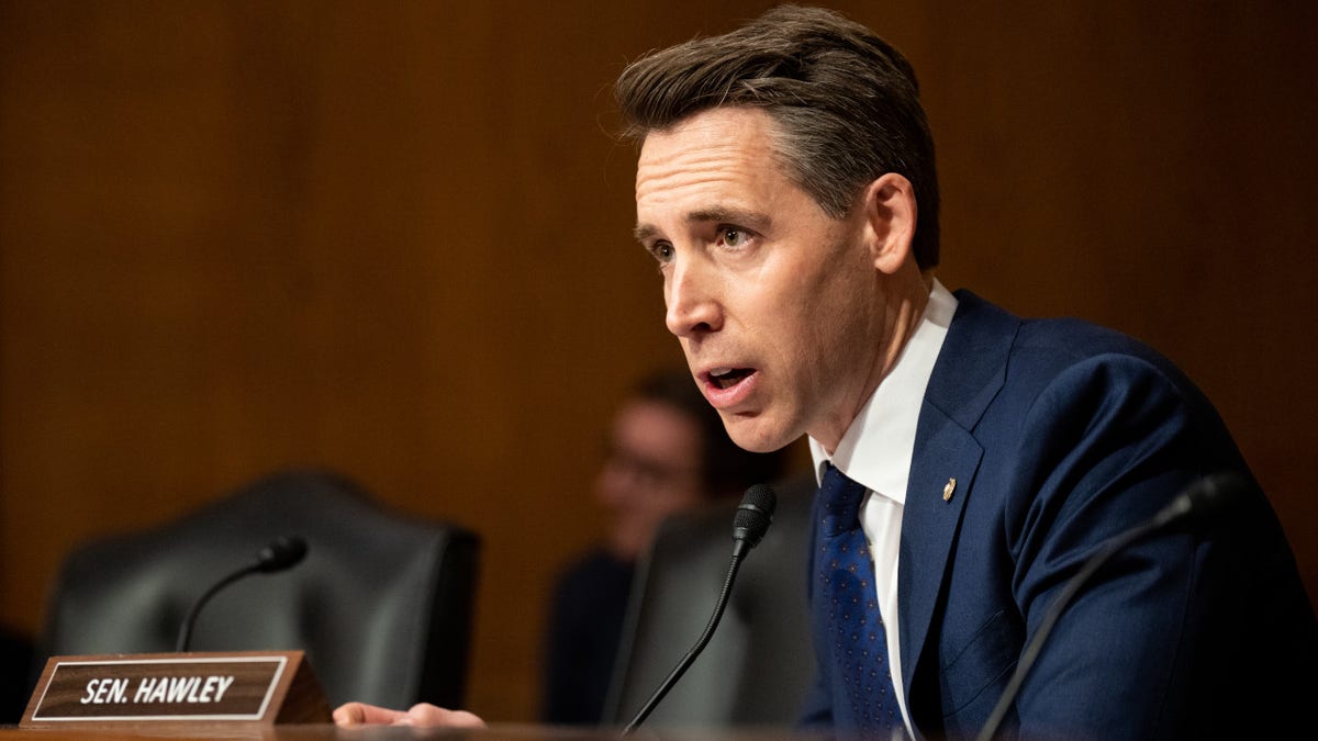 Sen. Josh Hawley speaks from the podium in a Senate hearing. 