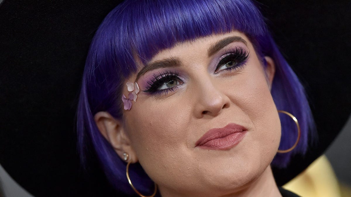 Kelly Osbourne smiling